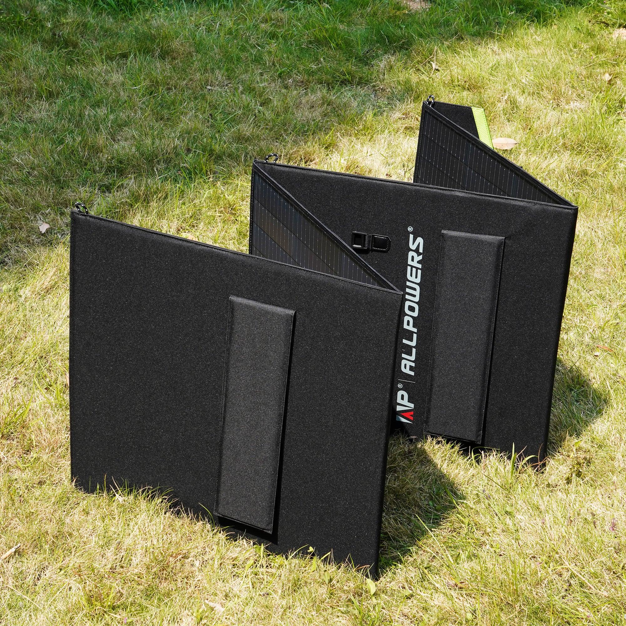 ALLPOWERS 200W Foldable Solar Panel SP033 displayed on grass, showing its black folding panels with kickstand support